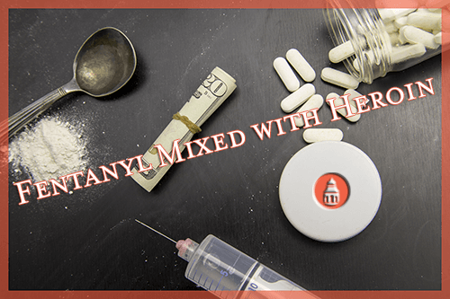 fentanyl, heroin, and other opioid drugs laying on a table